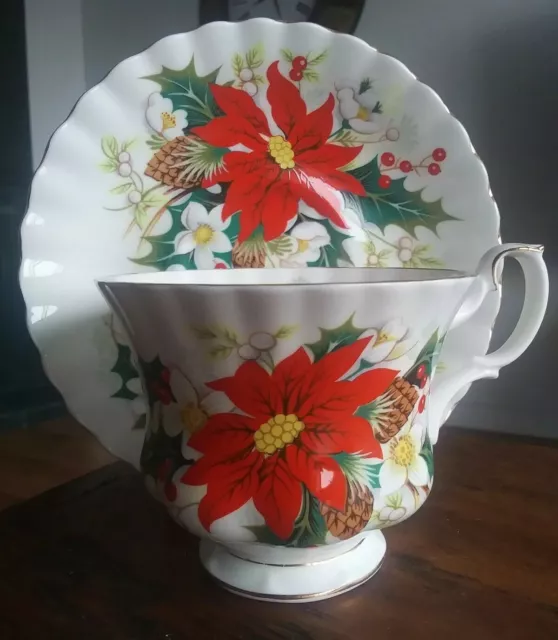 Elegant Royal Albert Yuletide Tea Cup and Saucer Christmas Poinsettia Bone China