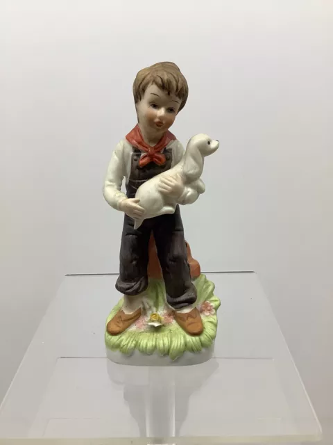 Norleans Taiwan porcelain farm boy figurine w/ puppy dog grass flowers