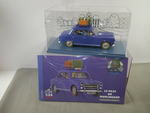 Modelauto Kuifje - Peugeot 403 - Le Taxi De Moulinsart Les Bijoux La Castafiore 1963 Modelauto Kuifje - Peugeot 403 - Le Taxi De Moulinsart Les Bijoux La Castafiore 1963