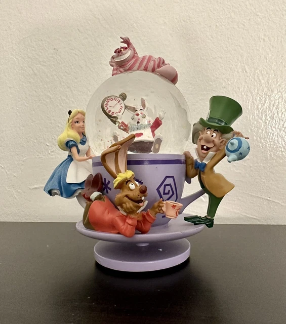 Disney Parks Alice in Wonderland Snow Globe Spinning Tea Cup Collectible Disney Parks Alice in Wonderland Snow Globe Spinning Tea Cup Collectible