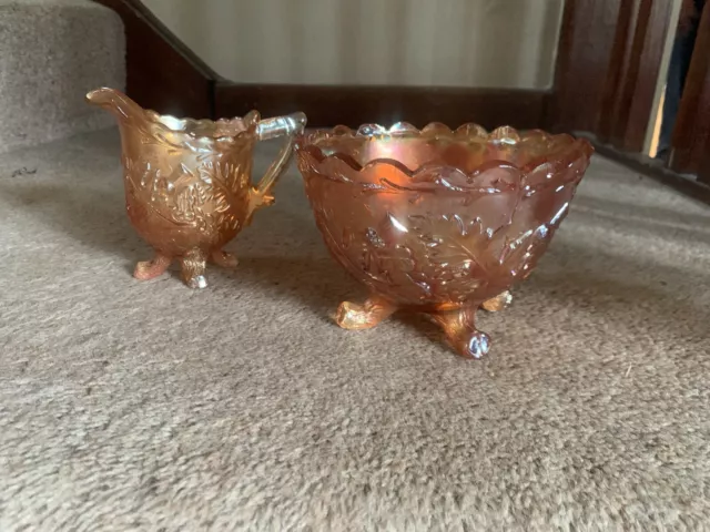 carnival glass thistle  jug with 4 feet and Sugar bowl with 3 feet. Free Postage