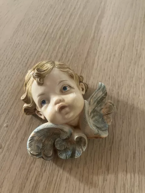 Cherub . plaque mould religious .guardian watching over us. .