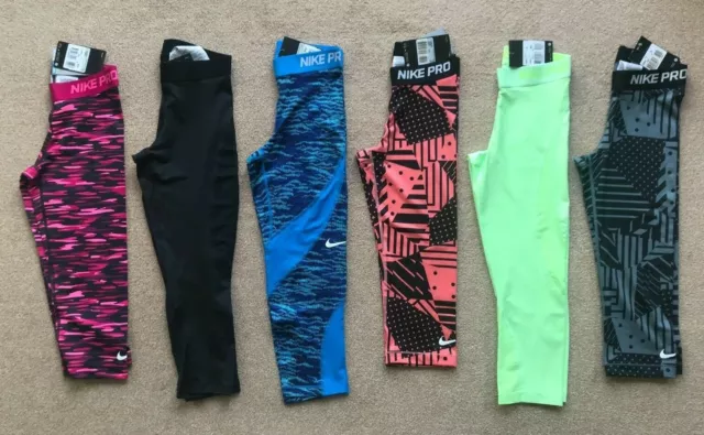 NIKE PRO 20" tights Size XS 6 8 S 8 10 BLACK PINK prints CAPRI BNWT