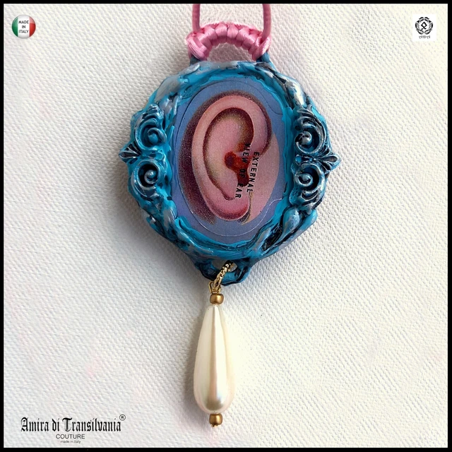 talismano amuleto barocco gioiello rituale di magia simbolo orecchio rosa perla