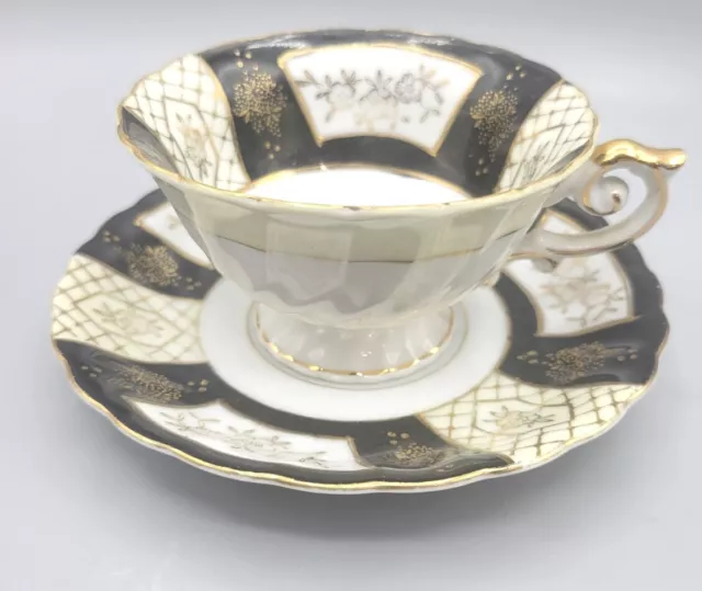 Ucagco China Hand Painted Japan Teacup Saucer - Black and Gold