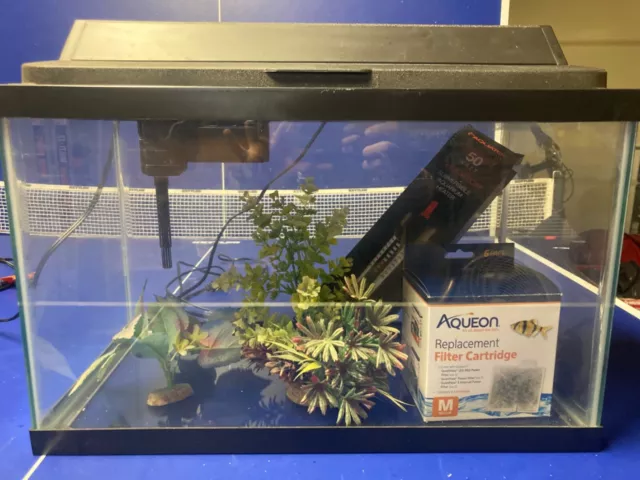 10 gallon fish tank with Aqueon pump filter, 5 Aqueon filter cartridges, etc.