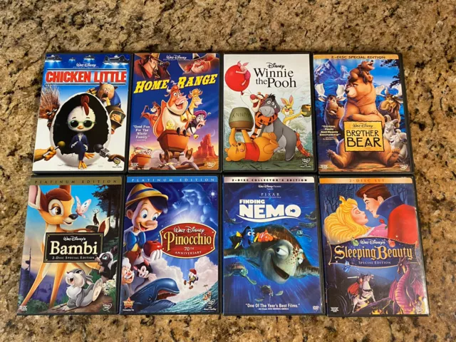 Lot of 8 Walt Disney DVDs Animated Classics Nemo Pinocchio Sleeping Beauty Bambi