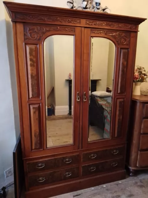 Late Victorian Double Wardrobe Mahogany with walnut finish on doors.