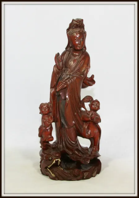 Superb "Chinese Wood Sculpture of Kwan Yin, Her Children with a Dragon at feet"