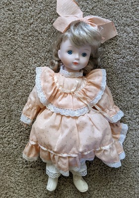 Antique Porcelain Doll Blond Hair Blue Eyes Girl Pink and White Dress 16 Inch