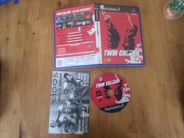 Jeu Twin Caliber Pour PlayStation 2 (PS2) - Bon état - Boîtier Et Disque - Sans Notice