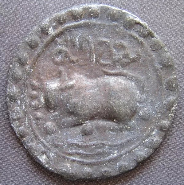 18th circa.--S. E. ASIA--ANCIENT COIN---LEFT-FACING CROUCHING BUFFALO--35 mm.
