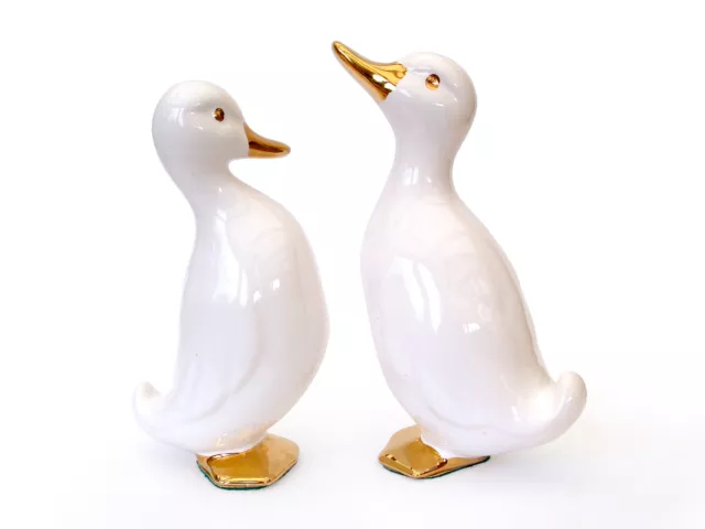 2  stilvolle Deko Enten aus Porzellan, Weiß und Gold, goldene Schnäbel