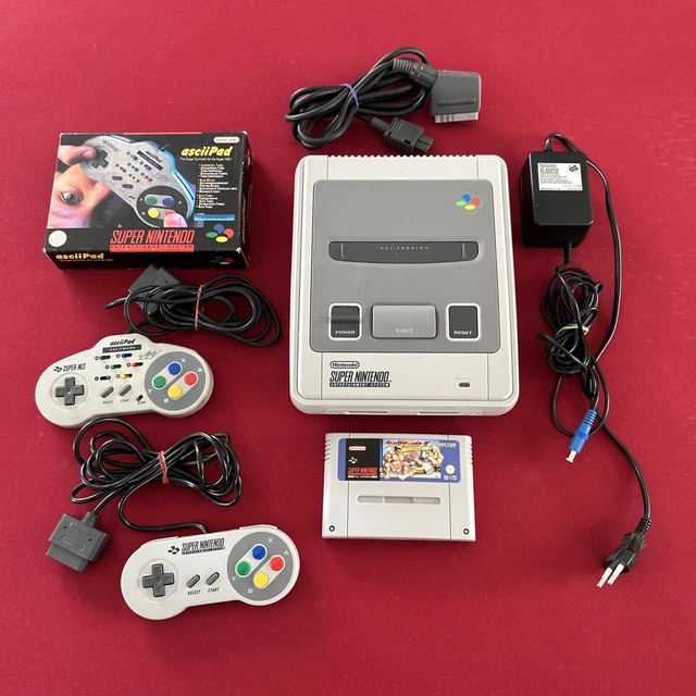 console super nintendo + 2 manette et 1 jeu street fighter 2 turbo
