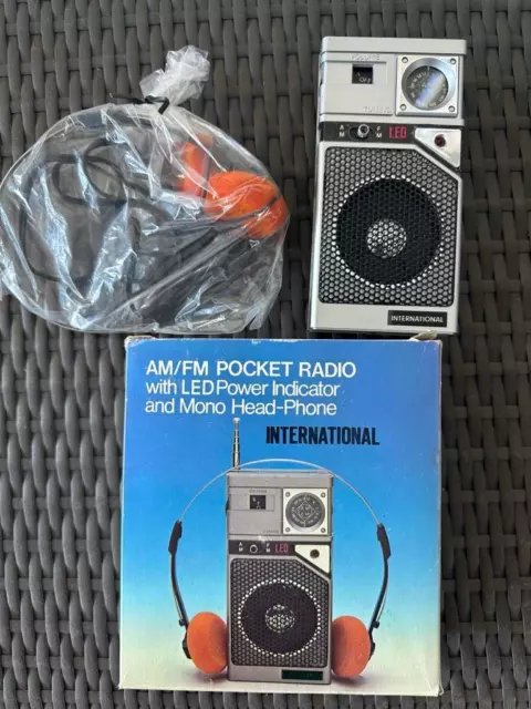 International AM/FM LED Pocket Radio W/ Headphones NOS in Original Box Hong Kong