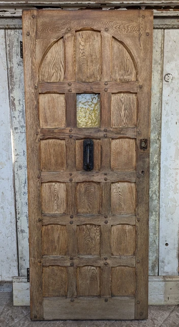 A RECLAIMED ART DECO GOTHIC STYLE OAK FRONT DOOR W807mm H2009mm DE0977