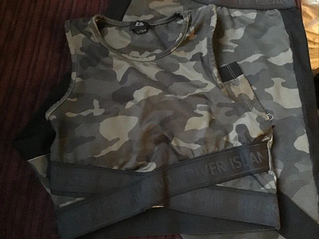 Girl’s grey & black H&M leggings and River Island crop top & leggings set 11-12