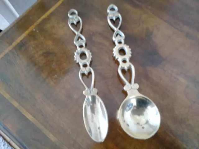 Pair of vintage brass Welsh love spoons 9ins good condition.