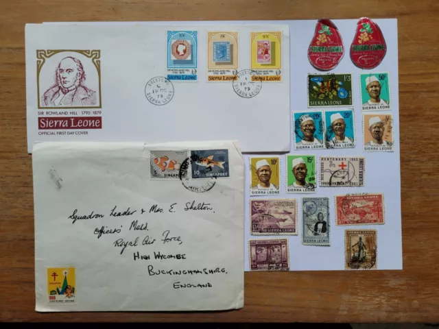 A selection of stamps from SIERRA LEONE + a FDC + a Singapore envelope.