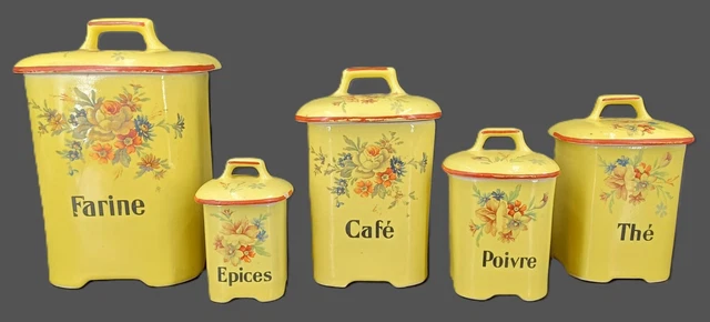 Suite de quatre boîtes à épices en faïence blanche à décor de