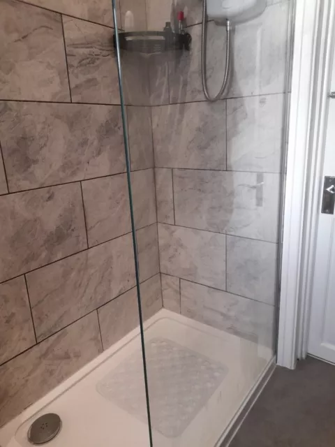 Glass shower screen, wet wall panels, shower tray. Brand new still in packaging