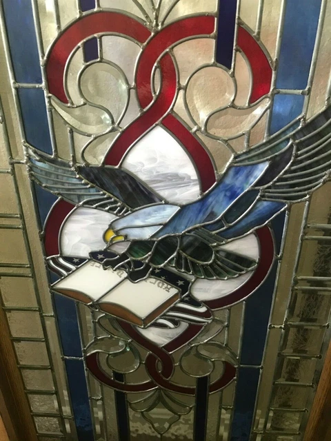 Eagle stained glass window — heavy leaded, framed in wood