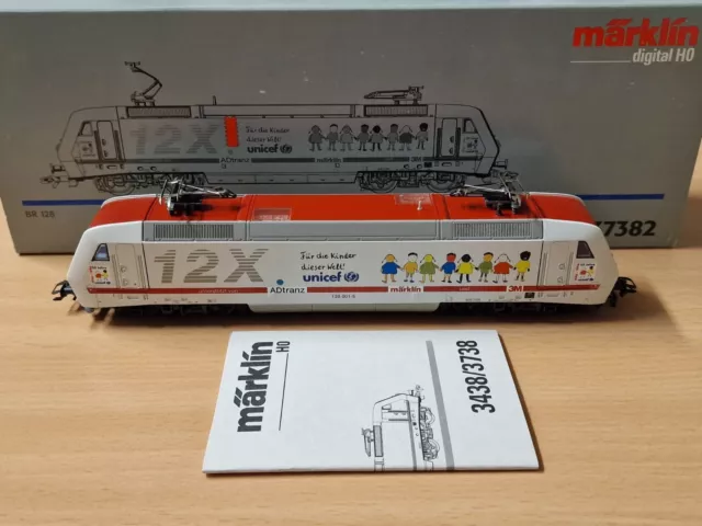 Märklin H0 37382 - E-Lok BR 128 001-5 DB " Unicef ADtranz " Digital - NEU !!