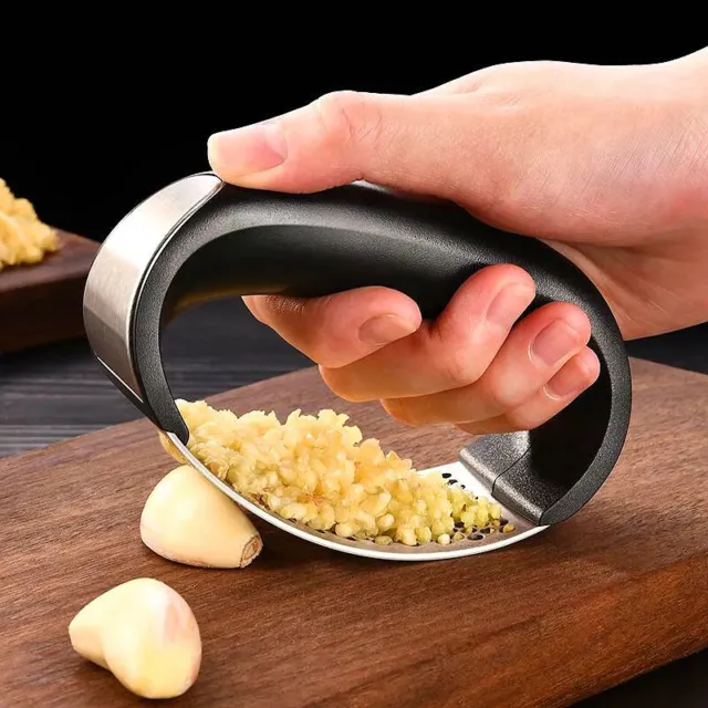 https://www.picclickimg.com/cAMAAOSwNVVllR-3/Stainless-Steel-Garlic-Press-Crusher-Manual-Garlic-Mincer.webp