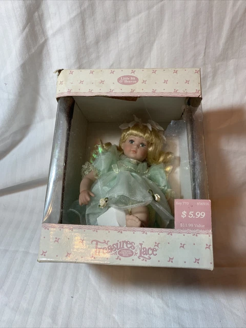 Treasures in lace sales genuine porcelain doll