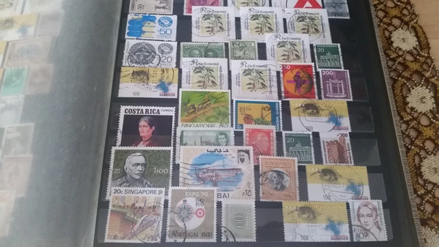 Briefmarken-Album, ca. 1500 Marken, weltweit, dt. Reich, asiatisch, etc.