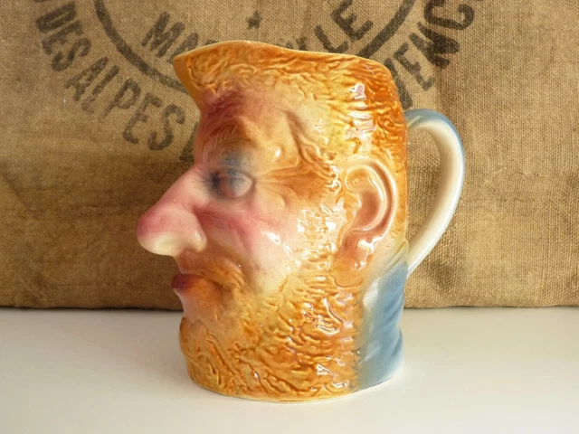 Pichet en barbotine anthropomorphe. Tête grotesque Sarreguemines " Jean "