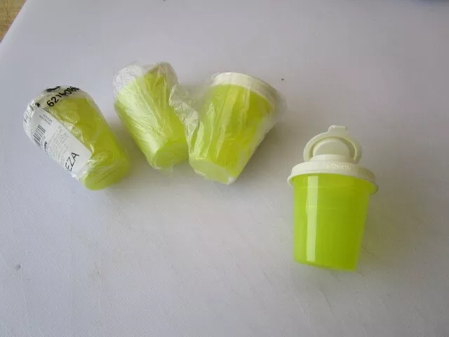 4 New Yellow Tupperware Salt Pepper Spice Shaker 2 Oz  Midget Mini 4 Per Order