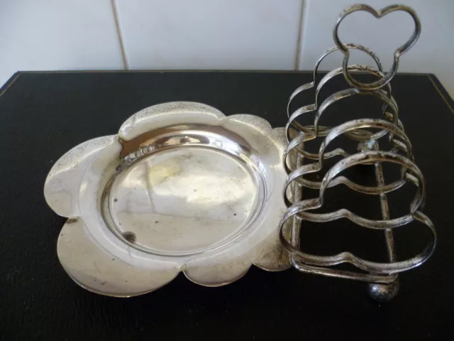 A Vintage Four Slice, Trefoil Shaped, Silver Plated Toast Rack With Butter Dish