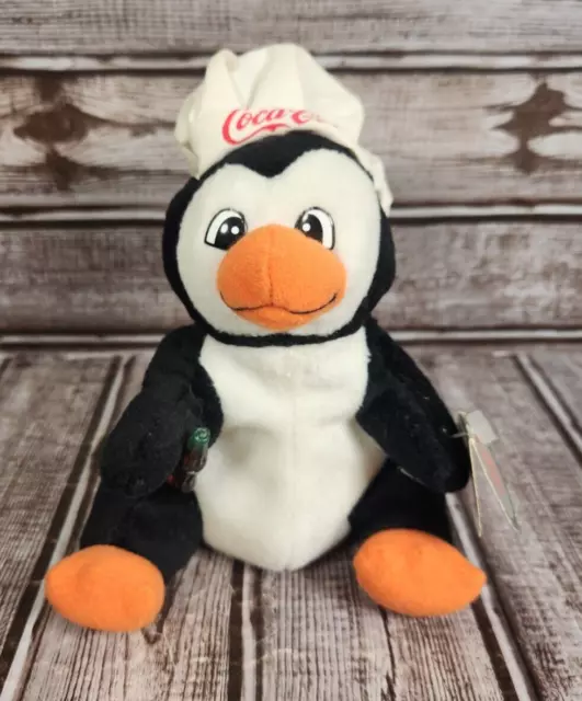 https://www.picclickimg.com/cCwAAOSwg1xkZs8p/COCA-COLA-Collectible-1998-Bean-Bag-Plush-Penguin-Chefs.webp