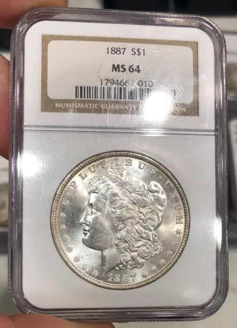 1887 Morgan Dollar graded MS64 by NGC Flashy Mostly White Coin PQ+