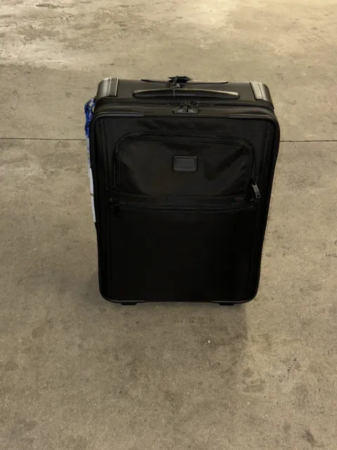 Tumi rolling carry on luggage