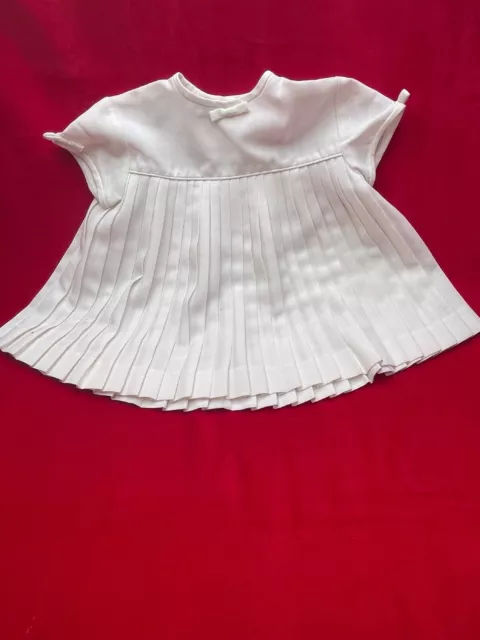 Ancienne robe blanche de petite fille