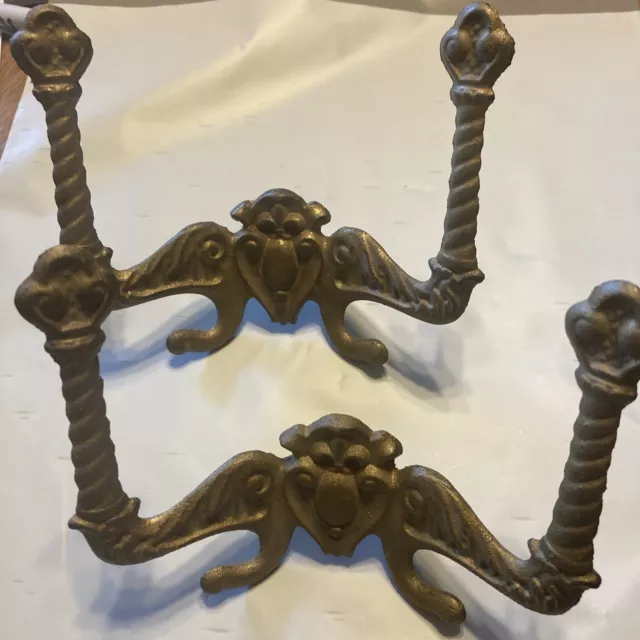 Pair of ANTIQUE WALL COAT HOOKS "LB 33" Fleur De Lis Crest CAST IRON 5.5"
