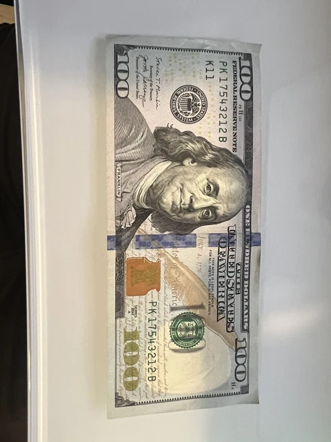 fancy $100 serial number ladder