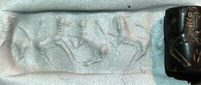 Ancient Near East black stone cylinder seal with animal contest scene