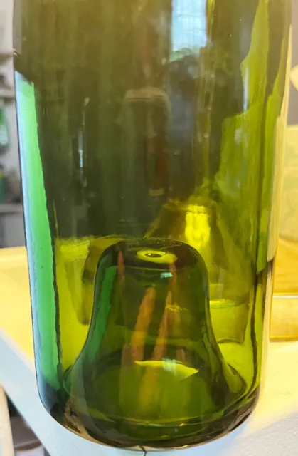 Pre 1860 dark green champagne bottle with kick up bottom