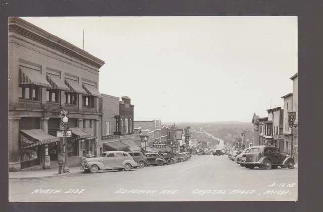 Crystal Falls MICHIGAN RPPC c1940 MAIN STREET Stores nr Iron River Mountain KB 2