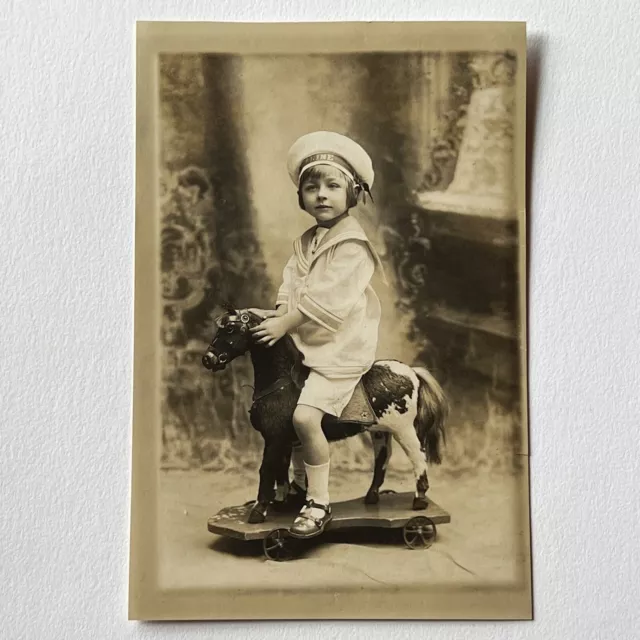 Antique Studio Photograph Adorable Little Boy Riding Beautiful Pull Horse Toy