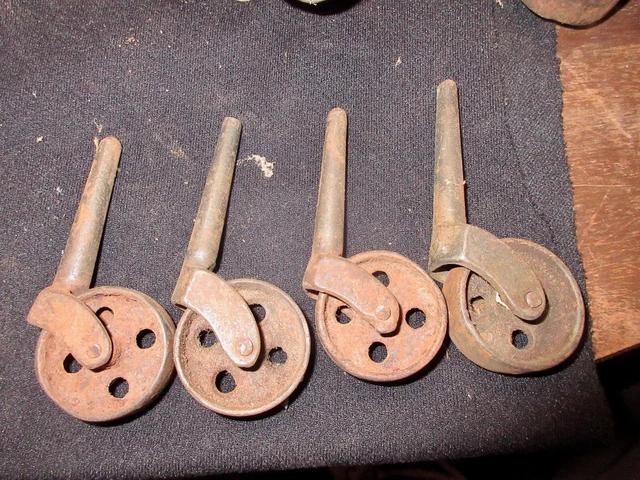 4 Vintage Casters Cast Iron 4 Holes   1.5" wheels #1