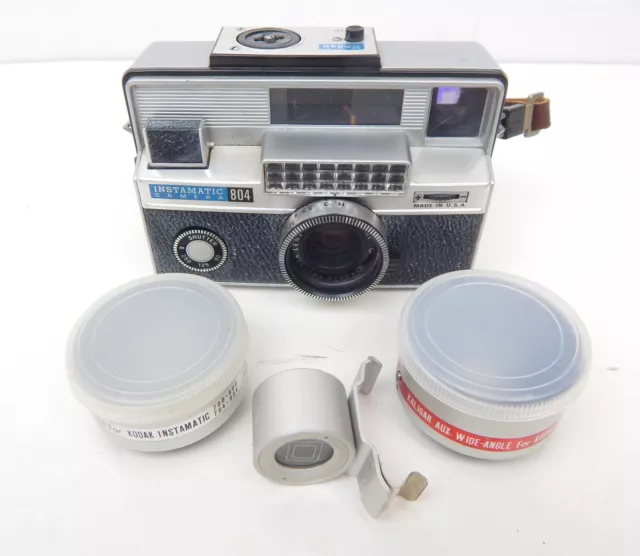 Cámara 2A Kodak Instamatic 804 con teleobjetivo y visor de lente gran angular