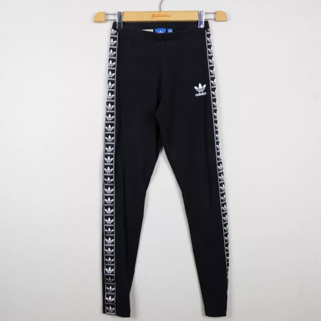 Tuta adidas con bottoni laterali hotsell