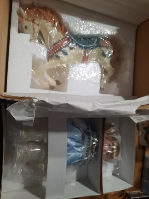 Vintage Heritage Signature Collection Porcelain Doll with Carousel Horse & Stand