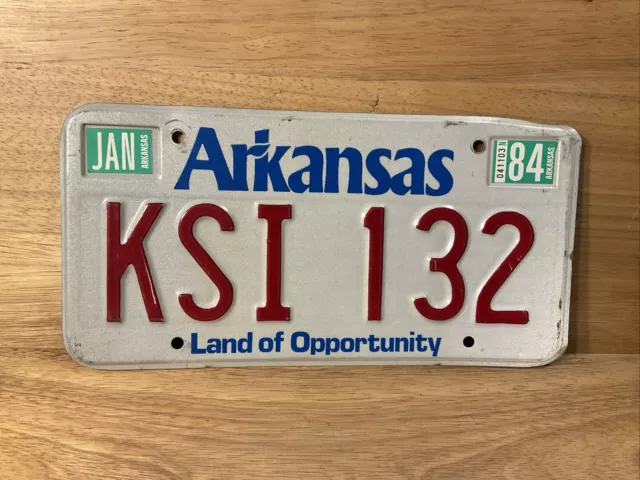 1984 Arkansas License Plate White w Red Letters Land of Opportunity KSI 132