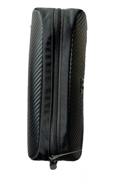 Tumi leather accessories kit, carbon fiber embossed