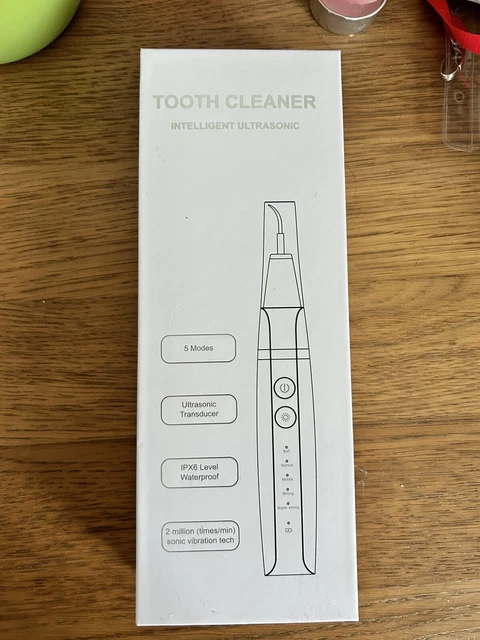 Limpiador dental eléctrico